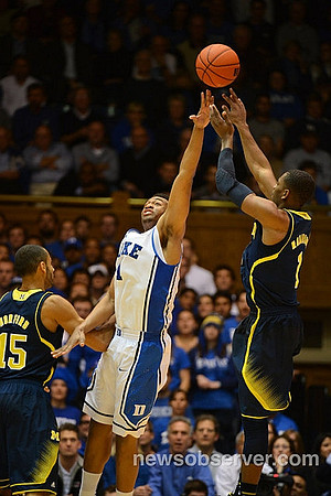 Jon Horford (15) and Glenn Robinson III (1)