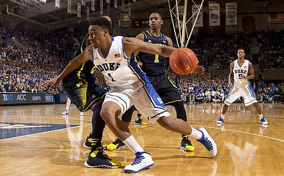 Zak Irvin (21) and Glenn Robinson III (1)