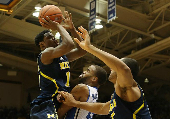 Glenn Robinson III (1) and Jon Horford (15)