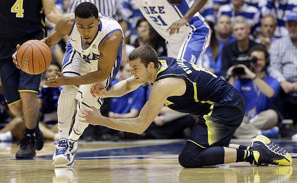 Mitch McGary (4) and Nik Stauskas (11)