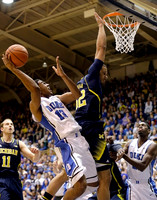 Nik Stauskas (11) and Jordan Morgan (52)
