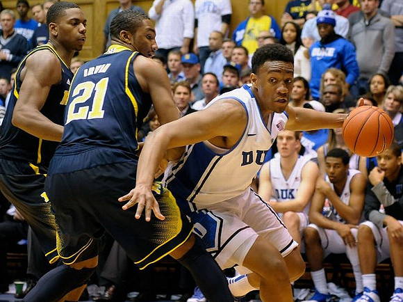 Glenn Robinson III (1) and Zak Irvin (21)
