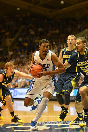 Spike Albrecht (2), Nik Stauskas (11), and Jordan Morgan (52)