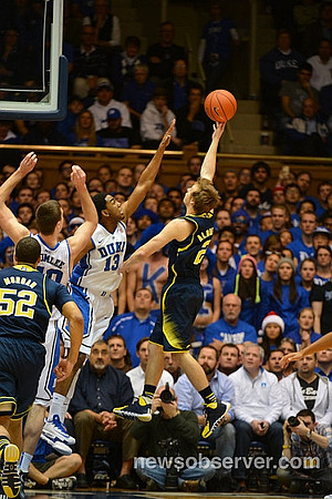 Jordan Morgan (52) and Spike Albrecht (2)