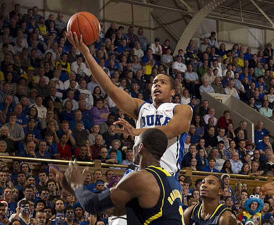 Glenn Robinson III (1) and Zak Irvin (21)