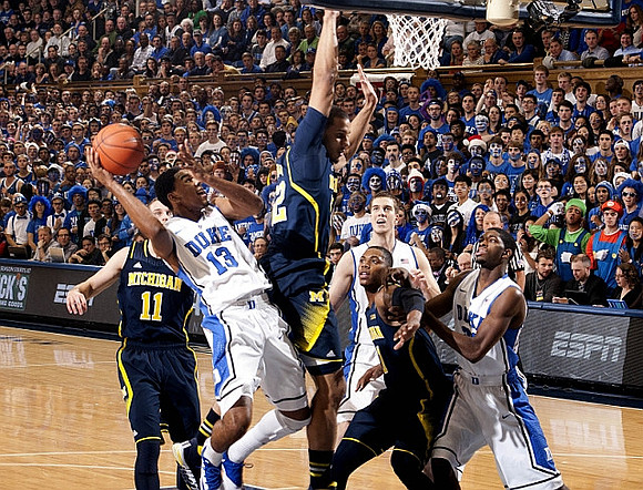 Nik Stauskas (11), Jordan Morgan (52), and Glenn Robinson III (1)