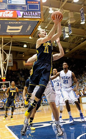 Nik Stauskas (11) and Glenn Robinson III (1)