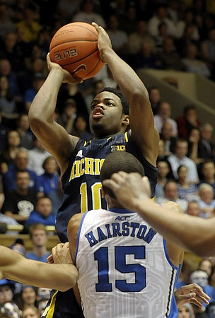 Caris LeVert (23) and Derrick Walton Jr. (10)