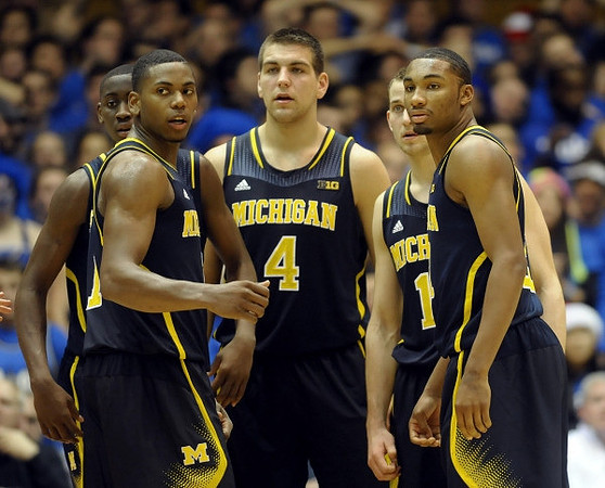 Mitch McGary (4), Nik Stauskas (11), Caris LeVert (23), and Glenn Robinson III (1)