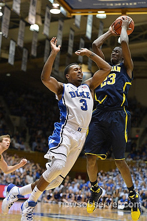 Spike Albrecht (2) and Caris LeVert (23)