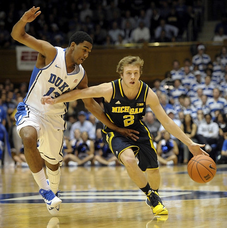 Caris LeVert (23) and Derrick Walton Jr. (10)