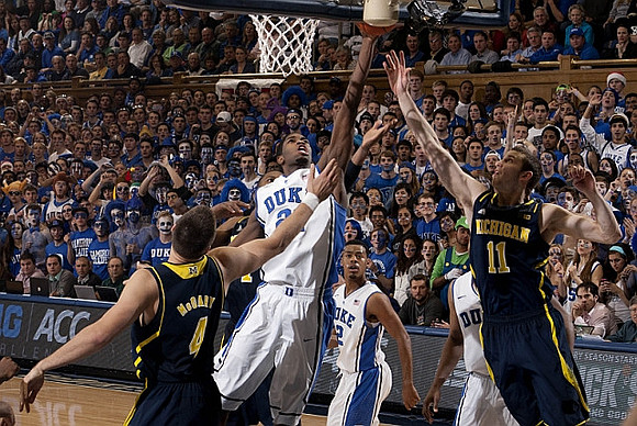 Mitch McGary (4) and Nik Stauskas (11)