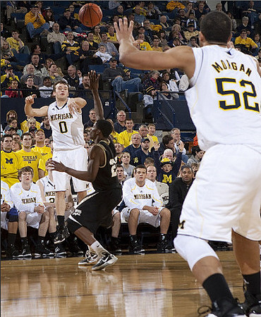 Zack Novak (0) and Jordan Morgan (52)
