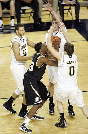 Jordan Morgan (52), Evan Smotrycz (23), and Zack Novak (0)