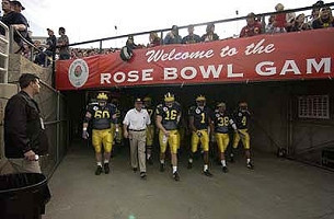 Grant Bowman (60), John Navarre (16), Lloyd Carr, Braylon Edwards (1),  Garrett Rivas (38), and Darnell Hood (4)