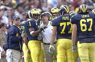Lloyd Carr, Matt Gutierrez (12), Braylon Edwards (1), Tony Pape (77), and Matt Lentz (67)
