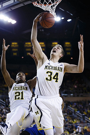 Zak Irvin (21) and Mark Donnal (34)
