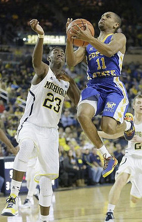 Caris LeVert (23) and Spike Albrecht (2)