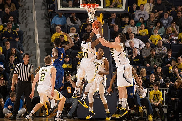 Spike Albrecht (2), Derrick Walton Jr. (10), Kameron Chatman (3), and Ricky Doyle (32)