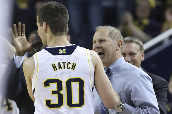 Austin Hatch (30), John Beilein, and Jeff Meyer