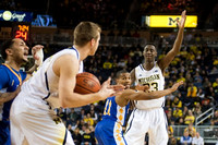 Spike Albrecht (2) and Caris LeVert (23)