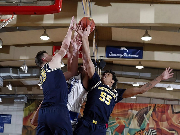 Jon Teske (15) and Eli Brooks (55)