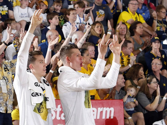 Duncan Robinson (22) and Moritz Wagner (13)