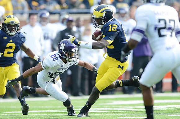 Vincent Smith (2) and Devin Gardner (12)