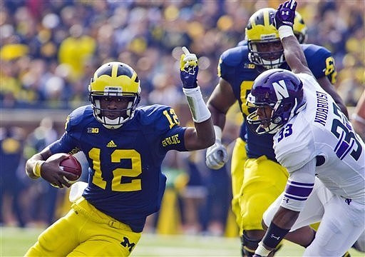 Devin Gardner (12) and Patrick Omameh (65)