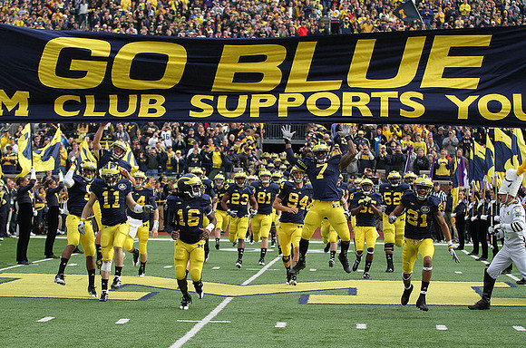 Jordan Kovacs (11), Denard Robinson (16), Floyd Simmons (23), Mike Kwiatkowski (81), Curt Graman (94), Brandin Hawthorne (7), Ricky Barnum (52), and Roy Roundtree (21)