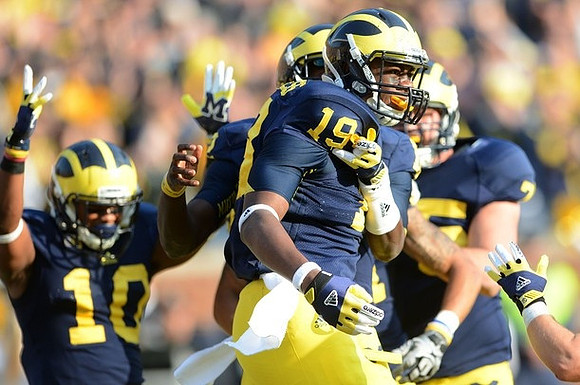 Jeremy Gallon (10), Devin Gardner (12), Devin Funchess (19), and Michael Schofield (75)