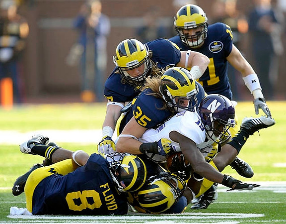 J.T. Floyd (8), Joe Bolden (35), Jake Ryan (47), and Jordan Kovacs (11)