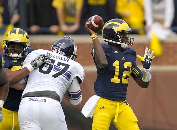 Vincent Smith (2) and Devin Gardner (12)