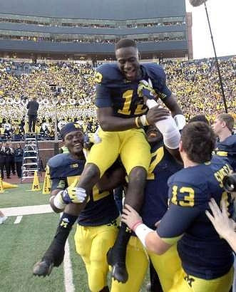 Royce Jenkins-Stone (52), Devin Gardner (12), Frank Clark (57), and Alex Swieca (13)