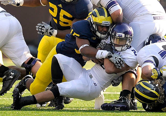 Kenny Demens (25), James Ross (15), and Jake Ryan (47)
