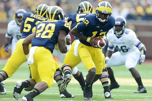 Fitzgerald Toussaint (28), Devin Gardner (12), Ricky Barnum (52), and Elliott Mealer (57)