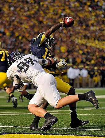 Michael Schofield (75) and Devin Gardner (12)