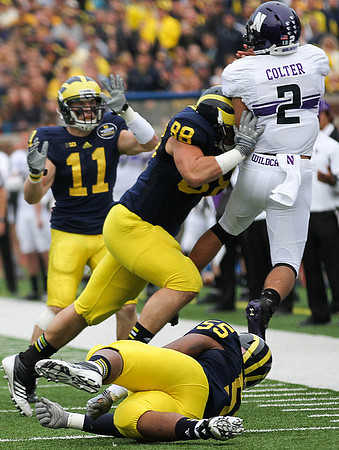 Jordan Kovacs (11), Craig Roh (88), and Jibreel Black (55)