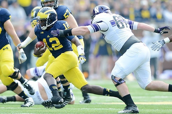 Devin Gardner (12), Elliott Mealer (57), and Patrick Omameh (65)