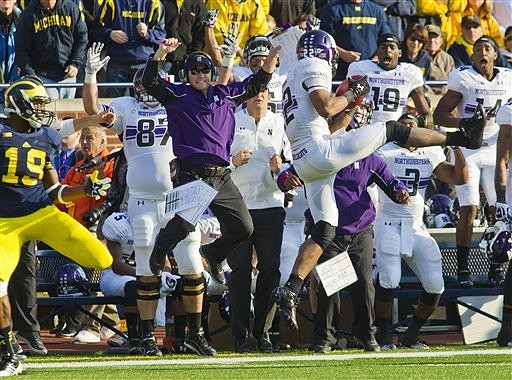 Devin Funchess (19) and Northwestern Head Coach Pat Fitzgerald