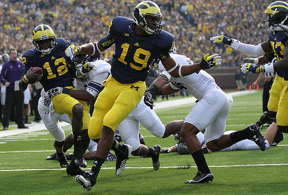 Devin Gardner (12) and Devin Funchess (19)