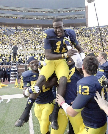 Royce Jenkins-Stone (52), Devin Gardner (12), Alex Swieca (13), and Frank Clark (57)