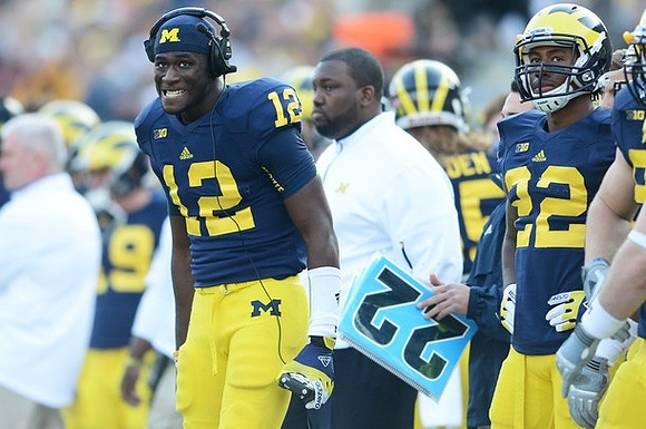 Devin Gardner (12), Joe Bolden (35), and Jarrod Wilson (22)