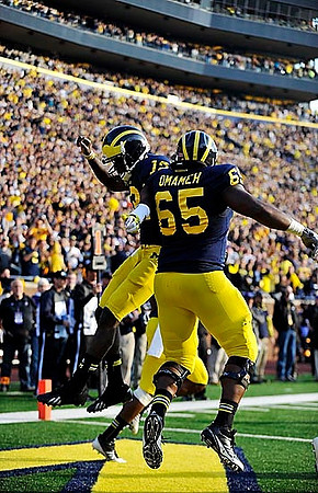 Devin Gardner (12) and Patrick Omameh (65)