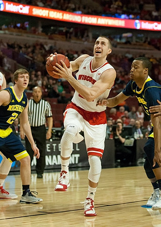 Spike Albrecht (2) and Muhammad-Ali Abdur-Rahkman (12)