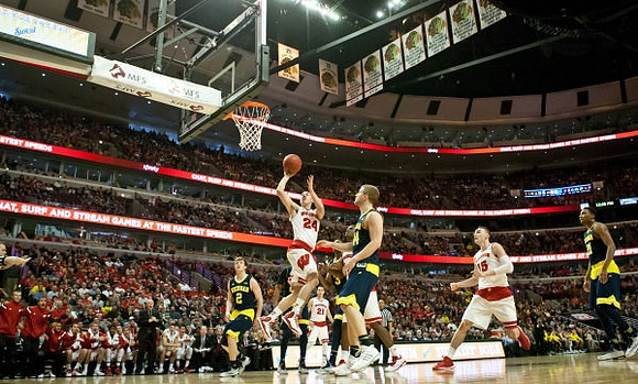 Spike Albrecht (2), Max Bielfeldt (44), and Zak Irvin (21)