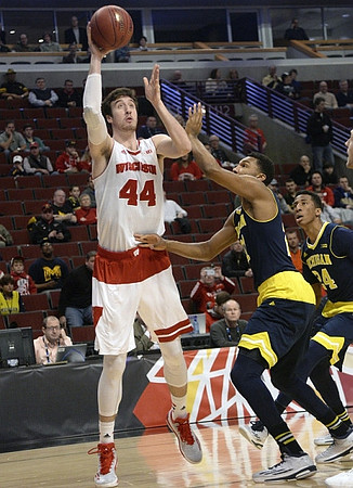 Zak Irvin (21) and Aubrey Dawkins (24)