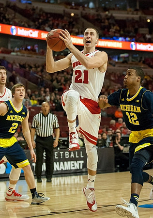 Spike Albrecht (2) and Muhammad-Ali Abdur-Rahkman (12)