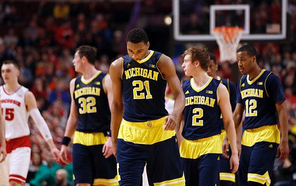 Ricky Doyle (32), Zak Irvin (21), Spike Albrecht (2), and Muhammad-Ali Abdur-Rahkman (12)