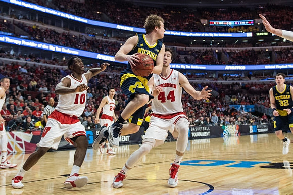 Spike Albrecht (2) and Ricky Doyle (32)